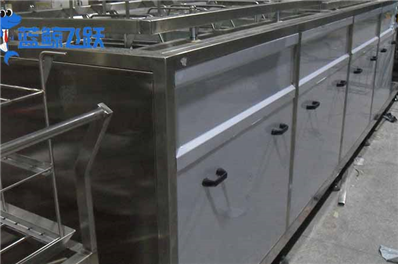 超声波清洗技术发展现状（大型工业化超声波清洗设备）